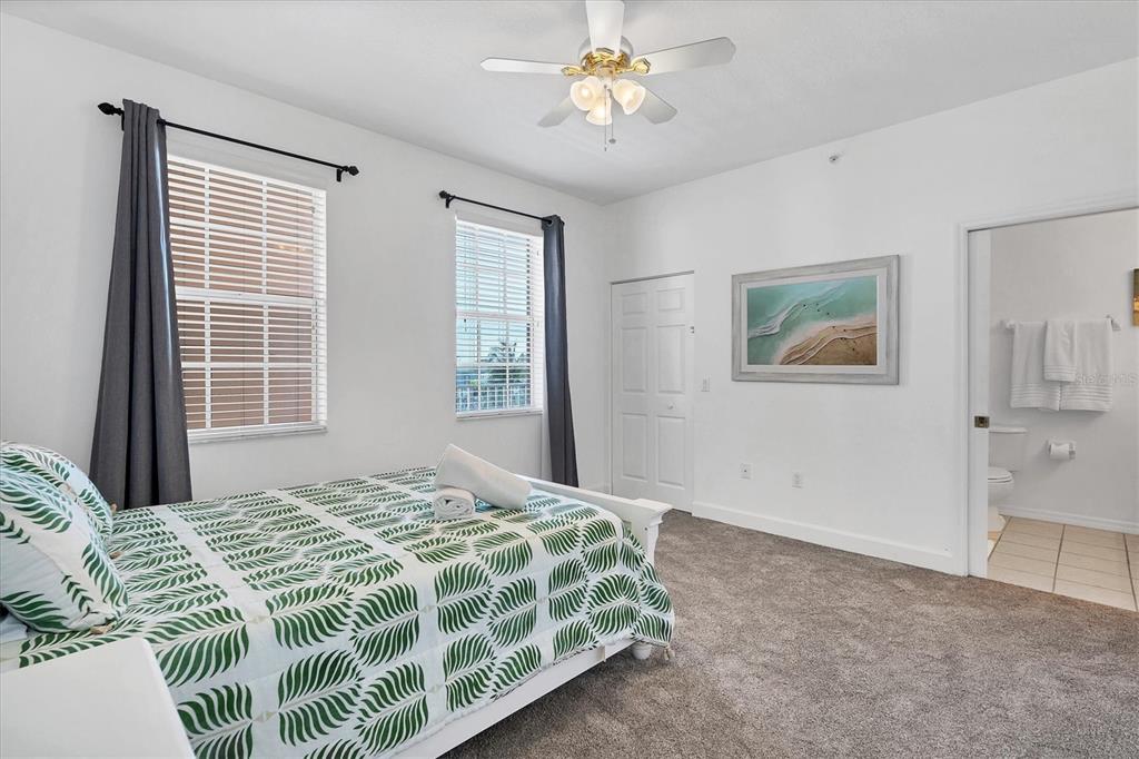 13113 Gasparilla Road, Unit 503 Placida, FL 33946 - Photo 9 of 18 a bedroom with a bed and a window