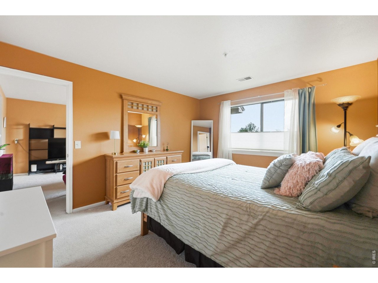 4985 Twin Lakes Road, Unit 94 Boulder, CO 80301 - Photo 10 of 29 The primary bedroom adjoins the living room.