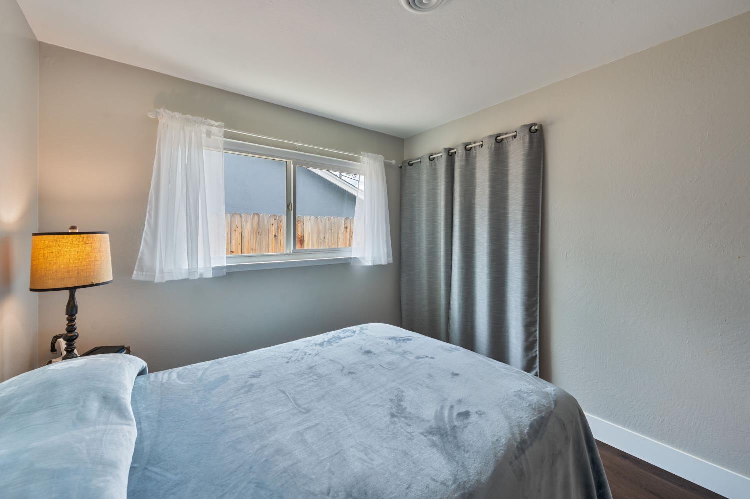 5422 Earnell Street Carmichael, CA 95608 - Photo 26 of 39 a bedroom with a bed and a window