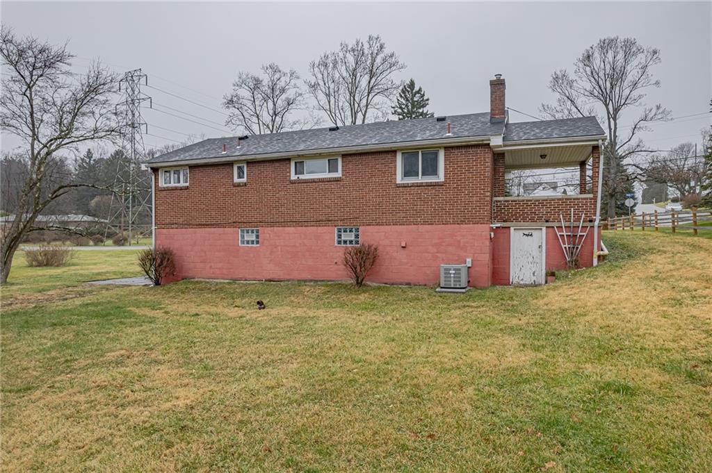 13850 Ridge Road North Huntingdon, PA 15642 - Photo 21 of 21 a front view of a house with a yard