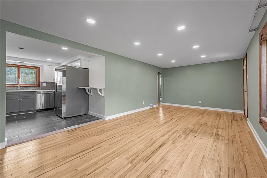 13850 Ridge Road North Huntingdon, PA 15642 - Photo 8 of 21 a view of empty room with wooden floor