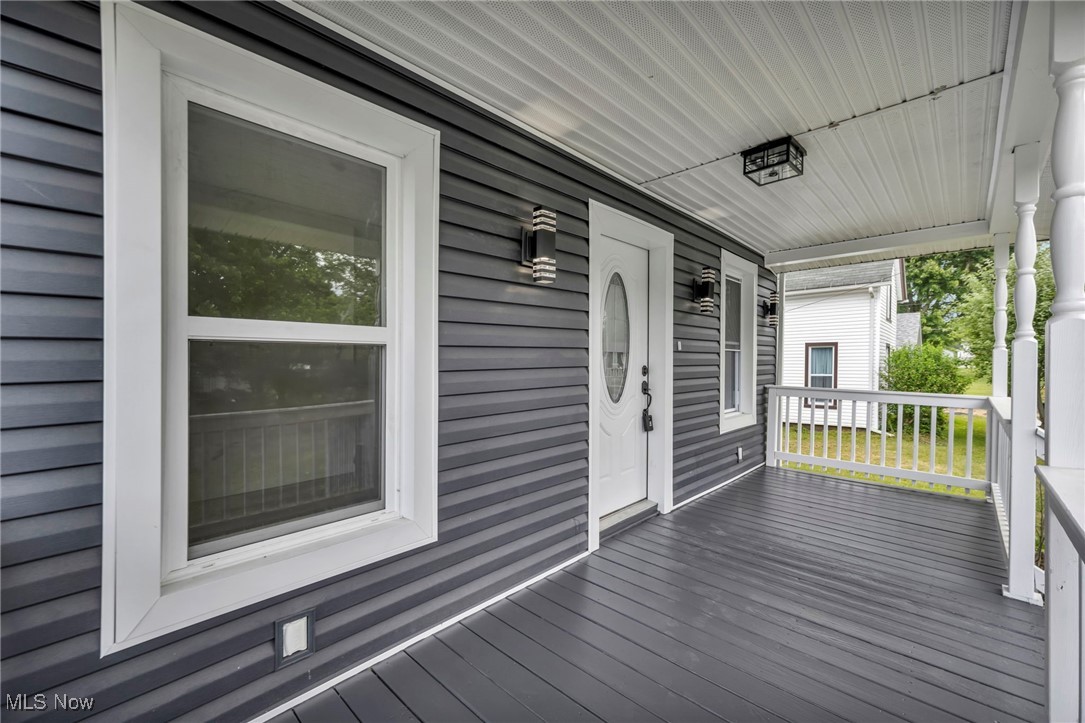 397 Furnace Road Conneaut, OH 44030 - Photo 25 of 36 View of wooden porch