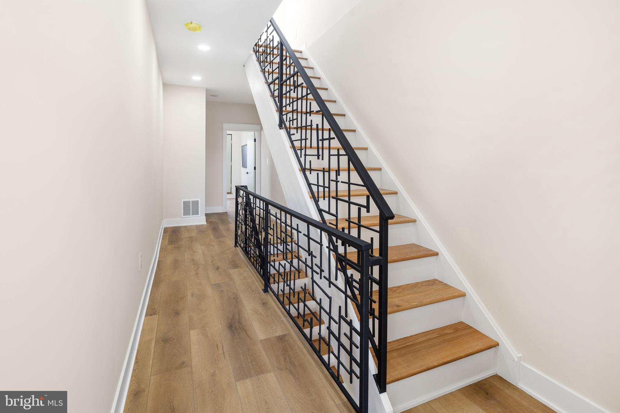 1731 Reed Street Philadelphia, PA 19146 - Photo 20 of 42 a view of entryway with wooden floor