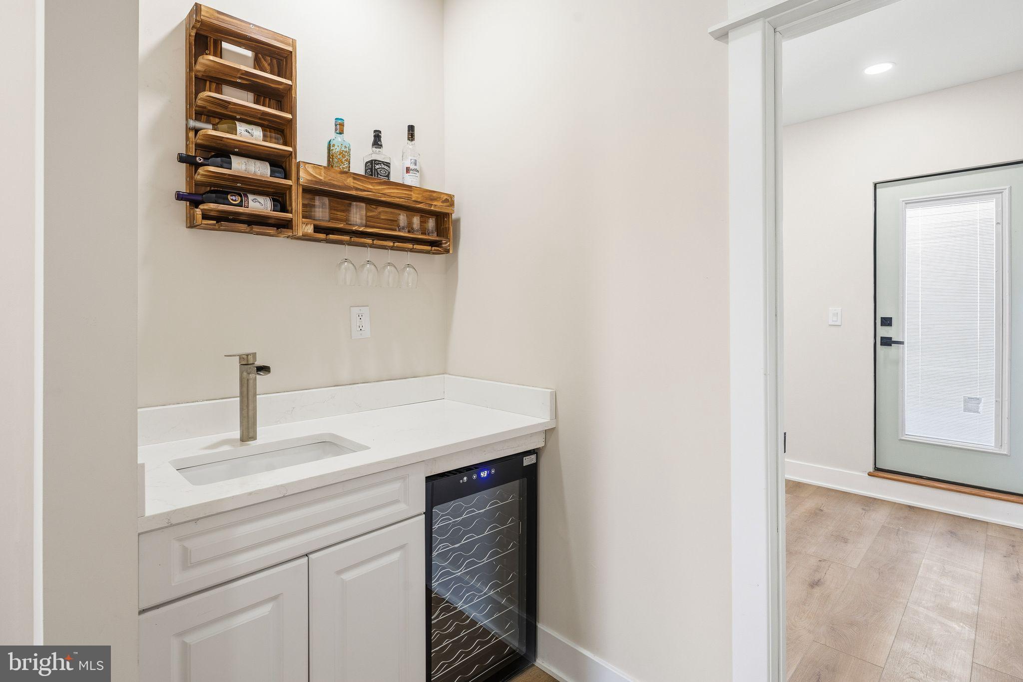 1731 Reed Street Philadelphia, PA 19146 - Photo 23 of 42 a bathroom with a sink and a mirror