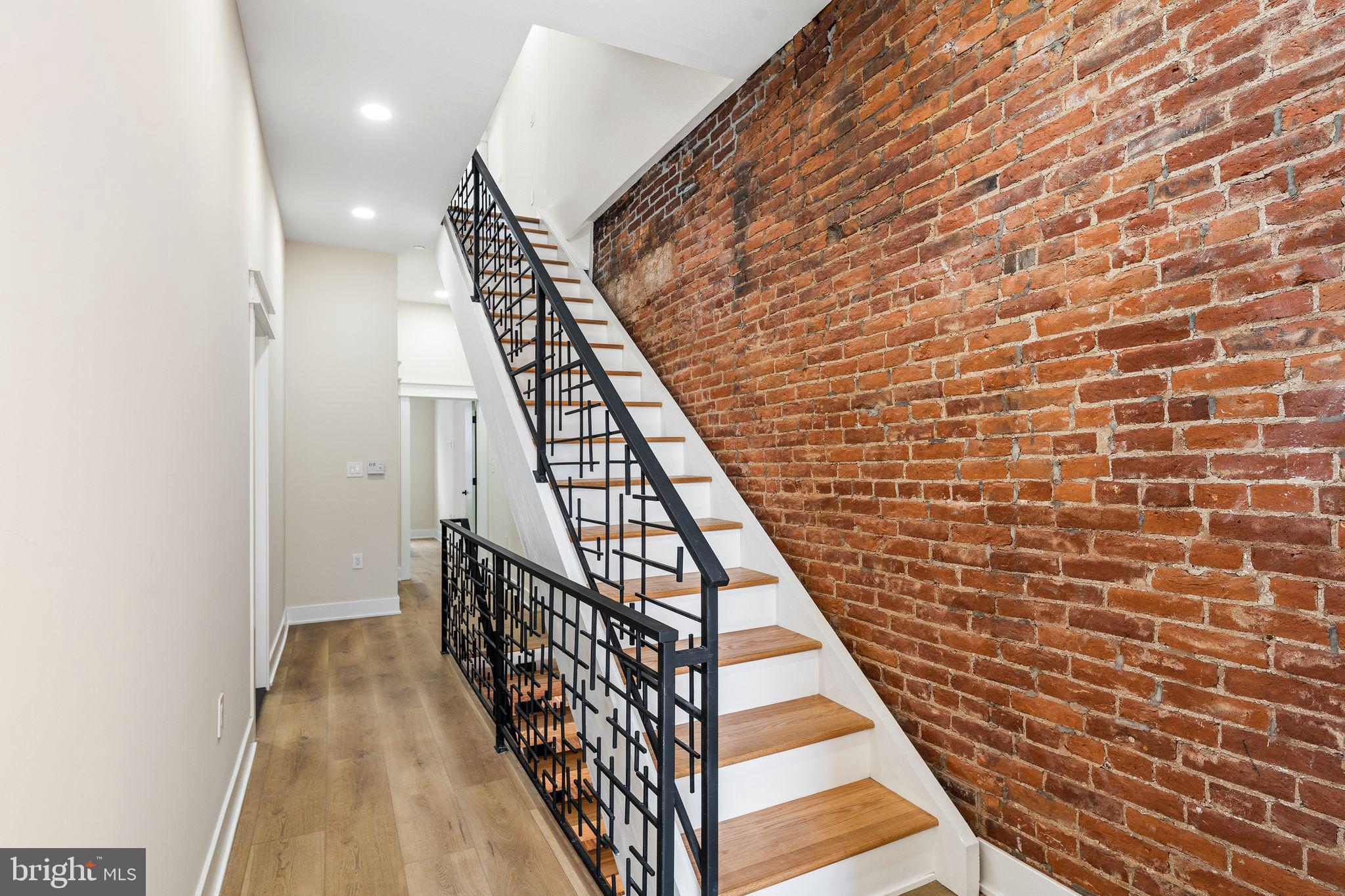 1731 Reed Street Philadelphia, PA 19146 - Photo 28 of 42 a view of entryway with wooden floor