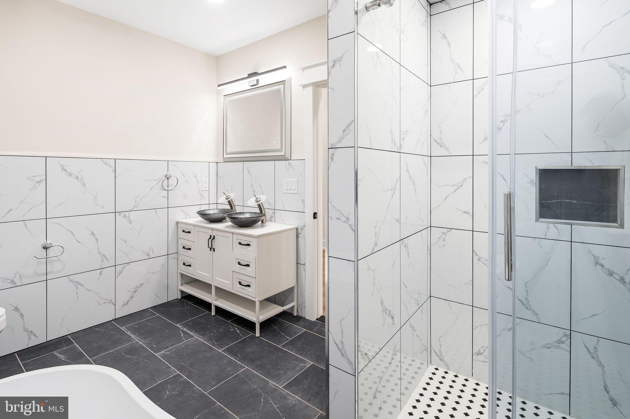 1731 Reed Street Philadelphia, PA 19146 - Photo 30 of 42 a bathroom with a sink