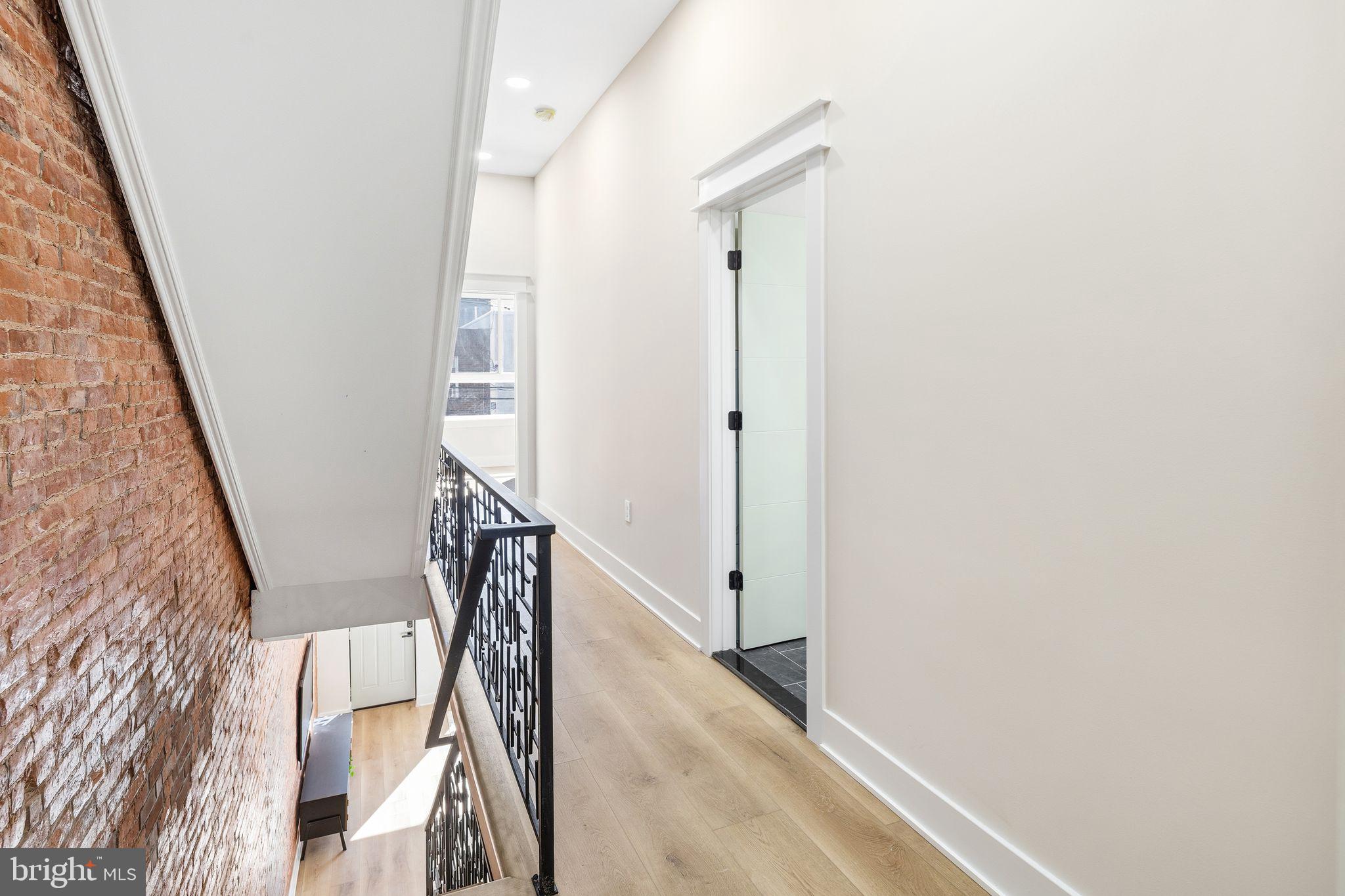 1731 Reed Street Philadelphia, PA 19146 - Photo 38 of 42 a view of entryway with wooden floor
