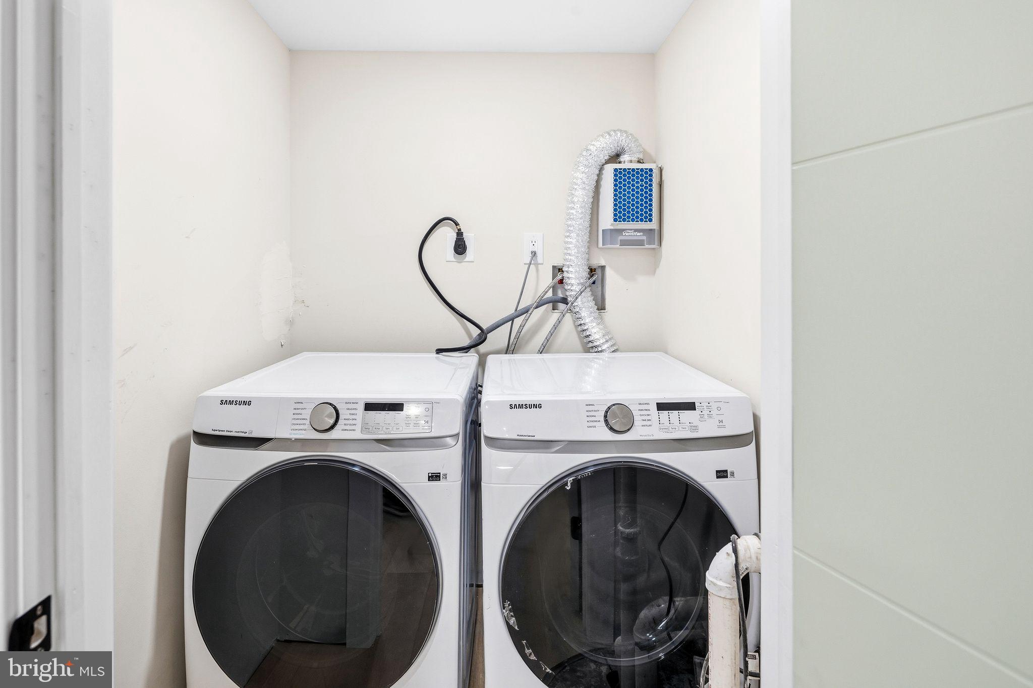 1731 Reed Street Philadelphia, PA 19146 - Photo 41 of 42 a utility room with dryer and washer