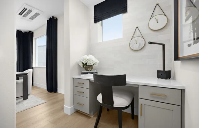 a dining room with furniture and window