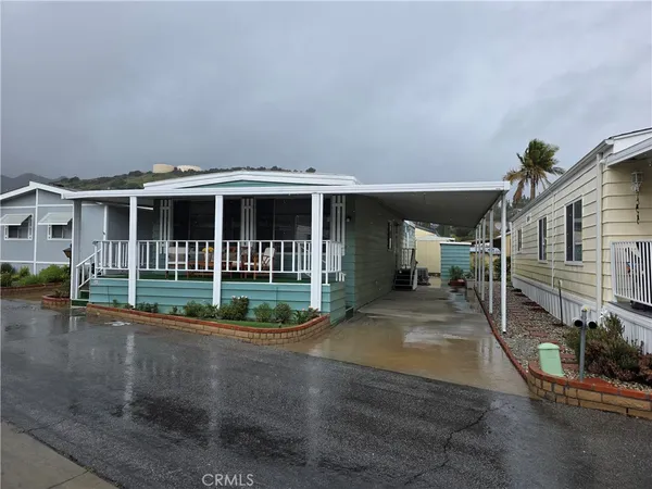 a view of a house with a porch