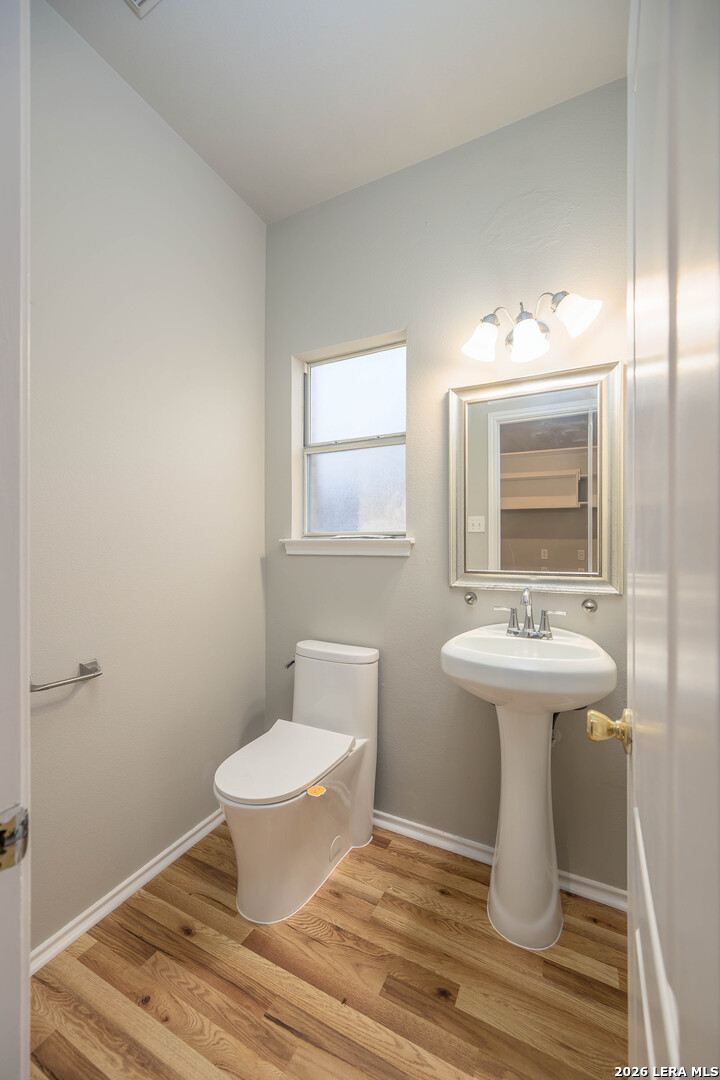 16558 Redland Ranch San Antonio, TX 78247 - Photo 14 of 17 a bathroom with a sink and a mirror