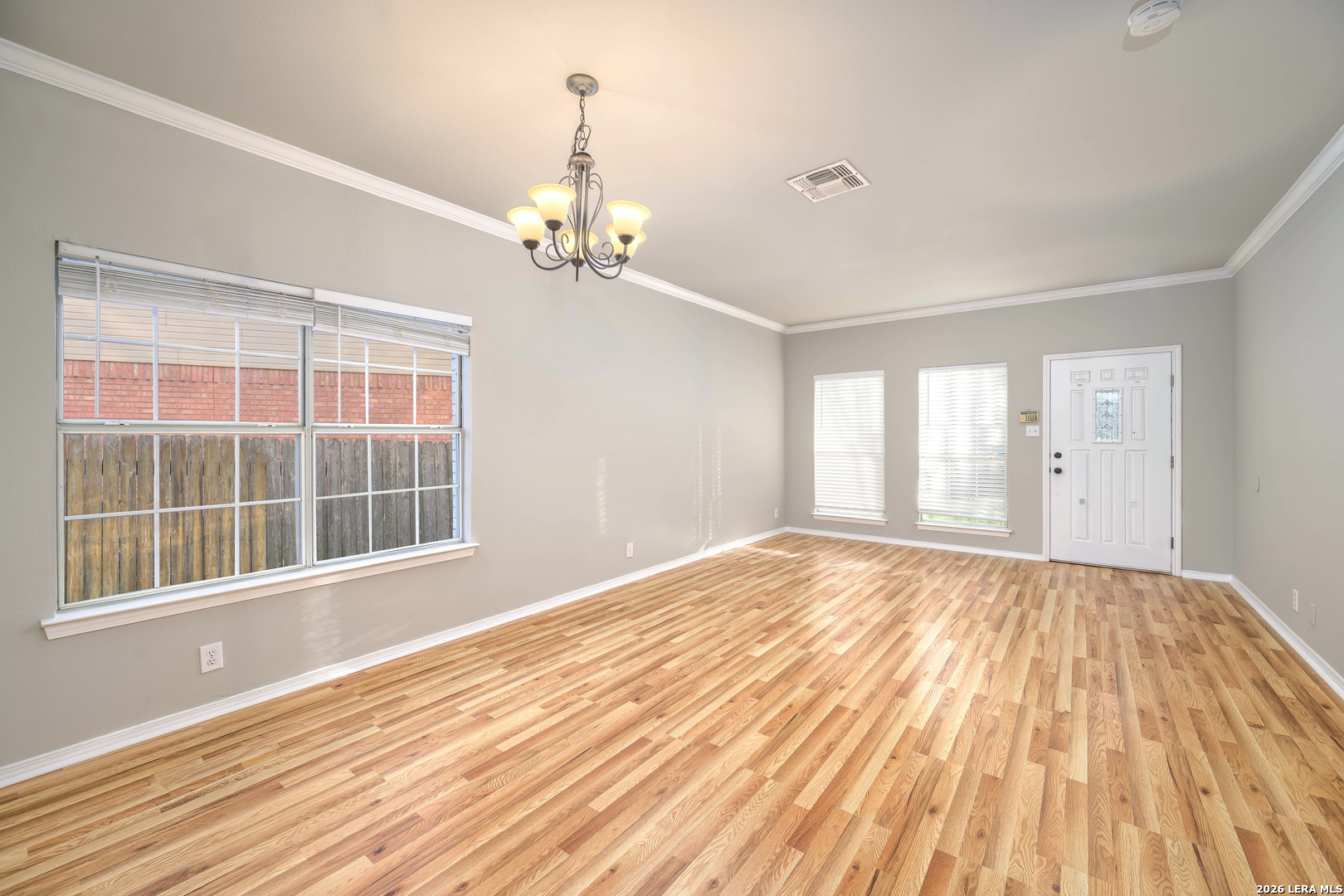 16558 Redland Ranch San Antonio, TX 78247 - Photo 4 of 17 a view of empty room with wooden floor and fan