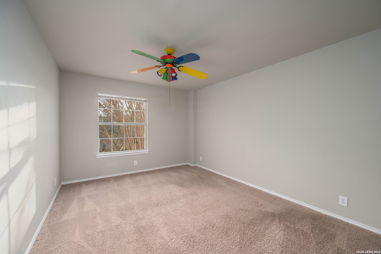 16558 Redland Ranch San Antonio, TX 78247 - Photo 9 of 17 an empty room with a window