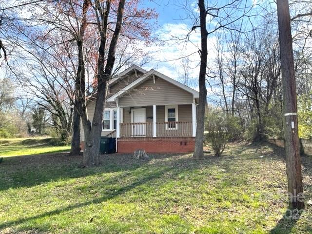 449 15th Street Southwest Hickory, NC 28602 - Photo 2 of 11 a front view of a house with a yard