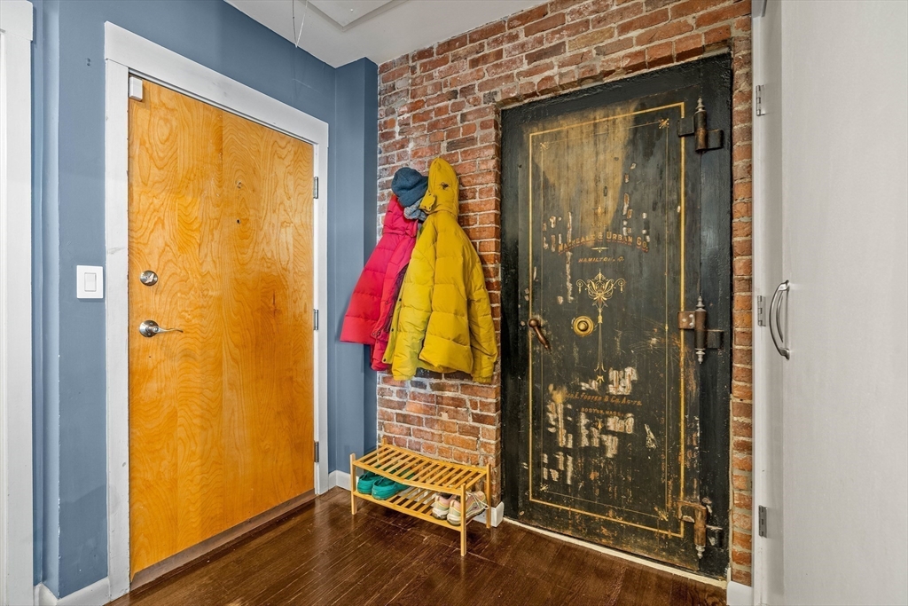 70 Exchange Street, Unit 206 Lynn, MA 01901 - Photo 11 of 40 a view of front door with wooden floor and a door