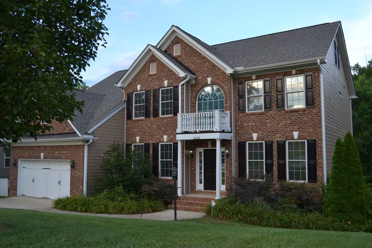 8425 Henderson Road Apex, NC 27539 - Photo 1 of 25 Beautiful Executive Homes with brick front, professionally landscaped yard, painted shutters, and watch the amazing sunsets from your covered porch! 8425 Henderson Road