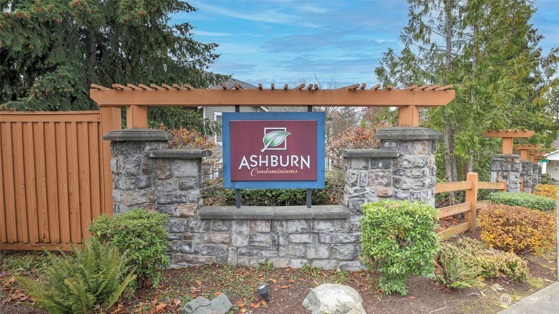 217 South 49th Street, Unit B Renton, WA 98055 - Photo 15 of 16 a sign on the side of a building