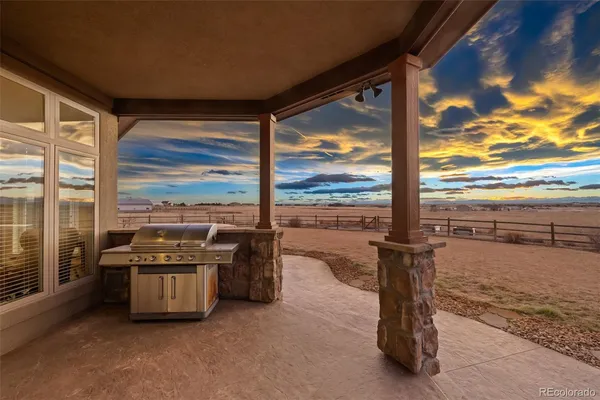 a view of a living room and dining room