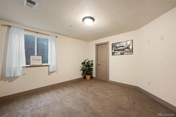 a picture of a bathroom with a shower