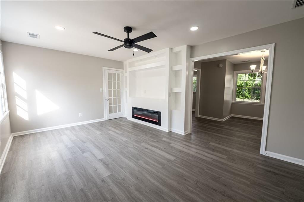 3122 Semmes Street Atlanta, GA 30344 - Photo 12 of 33 a view of empty room with wooden floor and window