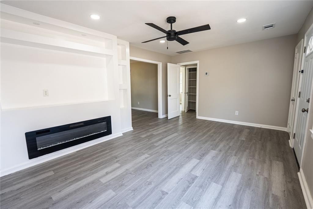 3122 Semmes Street Atlanta, GA 30344 - Photo 14 of 33 wooden floor in an empty room with a window