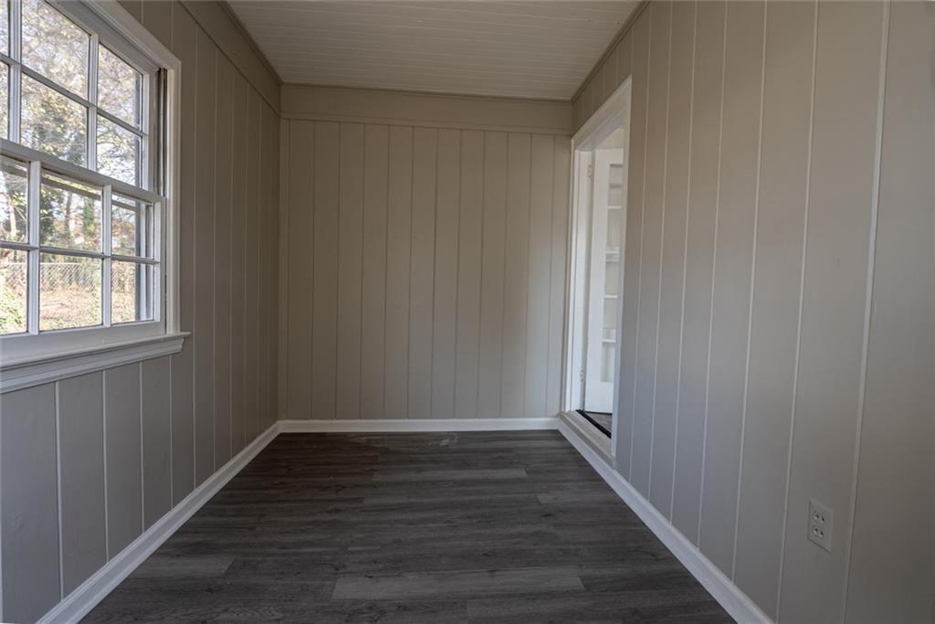 3122 Semmes Street Atlanta, GA 30344 - Photo 21 of 33 a view of an empty room with wooden floor and a window