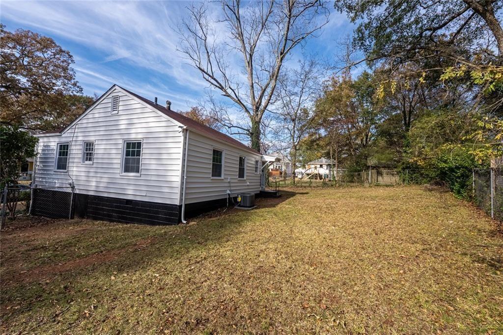 3122 Semmes Street Atlanta, GA 30344 - Photo 30 of 33 a view of a house with a yard
