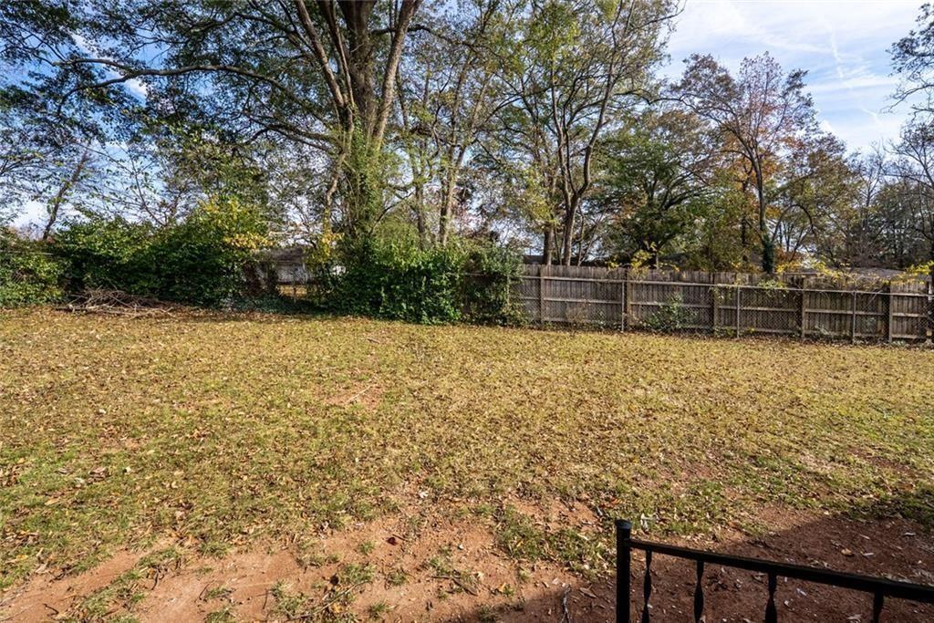 3122 Semmes Street Atlanta, GA 30344 - Photo 32 of 33 a view of swimming pool with trees in the background