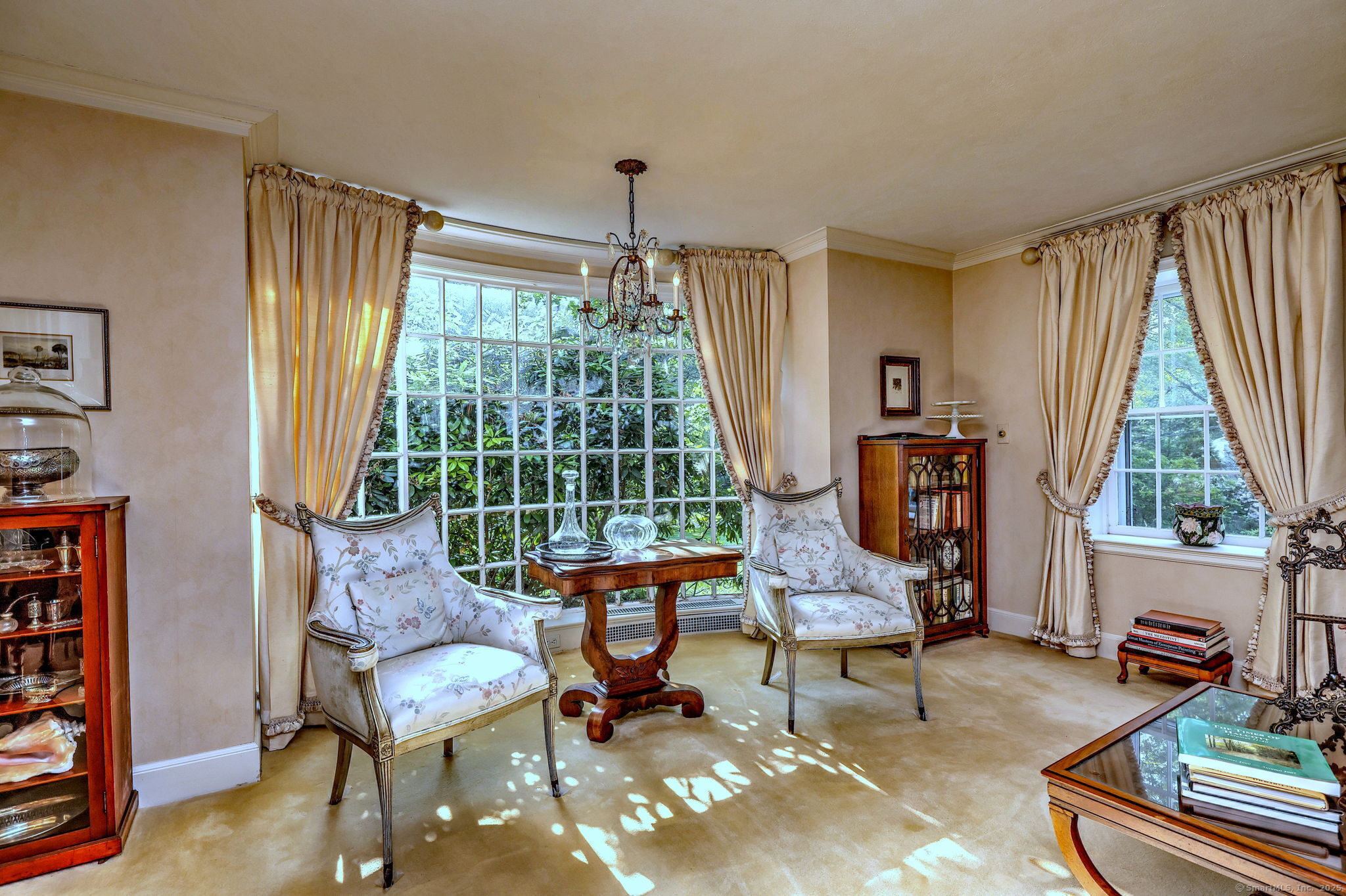 4 Brook Road Woodbridge, CT 06525 - Photo 11 of 40 a living room with furniture and a large window