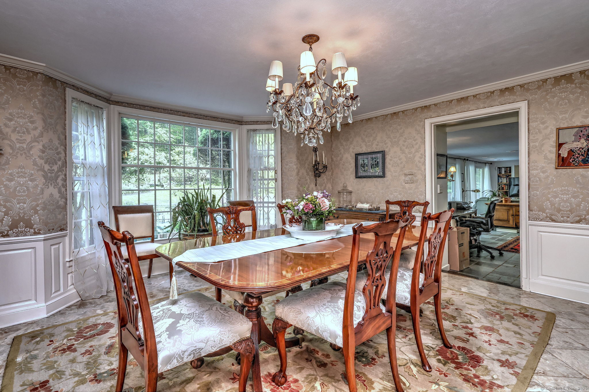 4 Brook Road Woodbridge, CT 06525 - Photo 11 of 40 a view of a dining room with furniture window and outside view