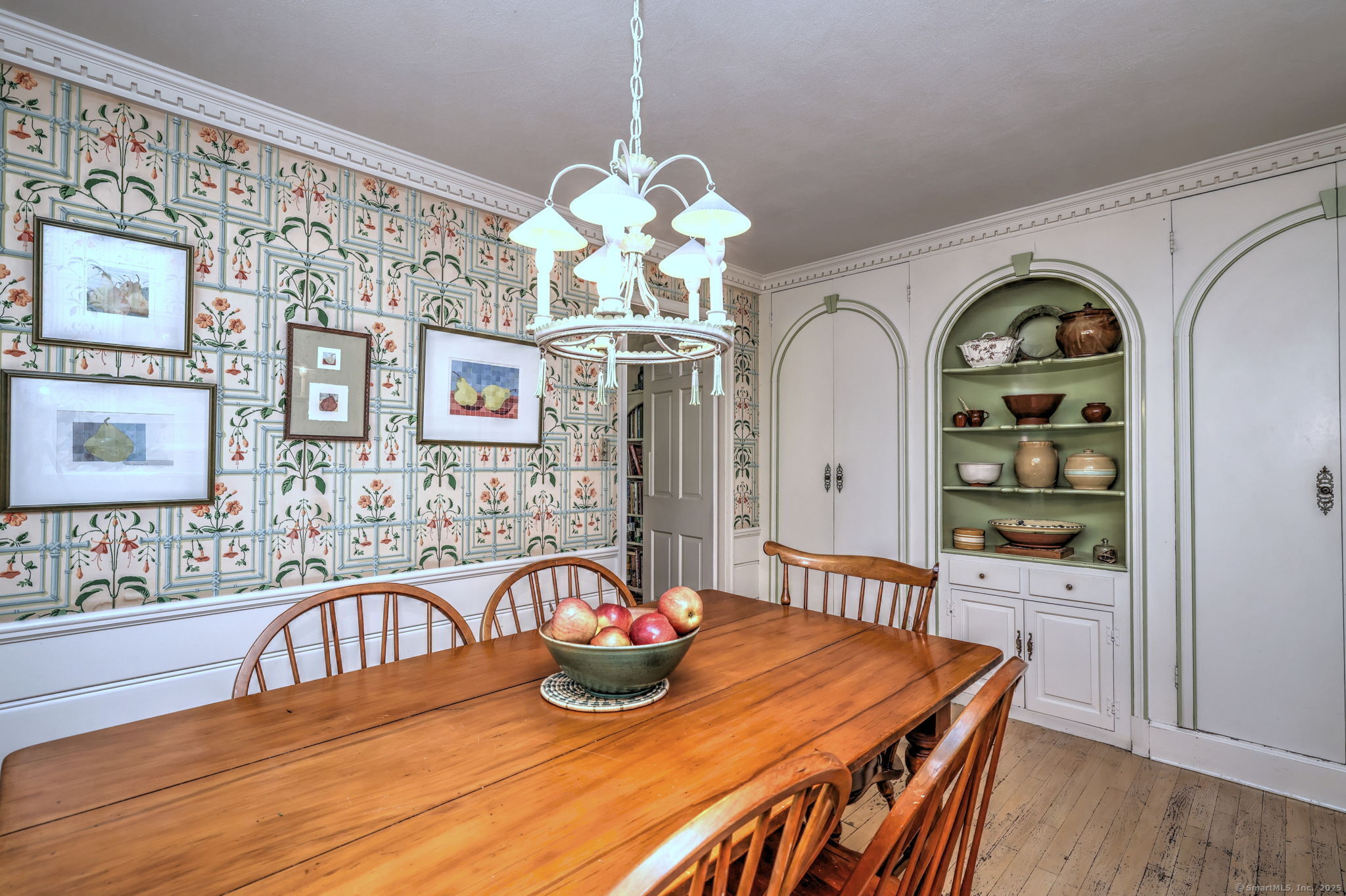 4 Brook Road Woodbridge, CT 06525 - Photo 19 of 40 a view of a dining room with furniture and chandelier