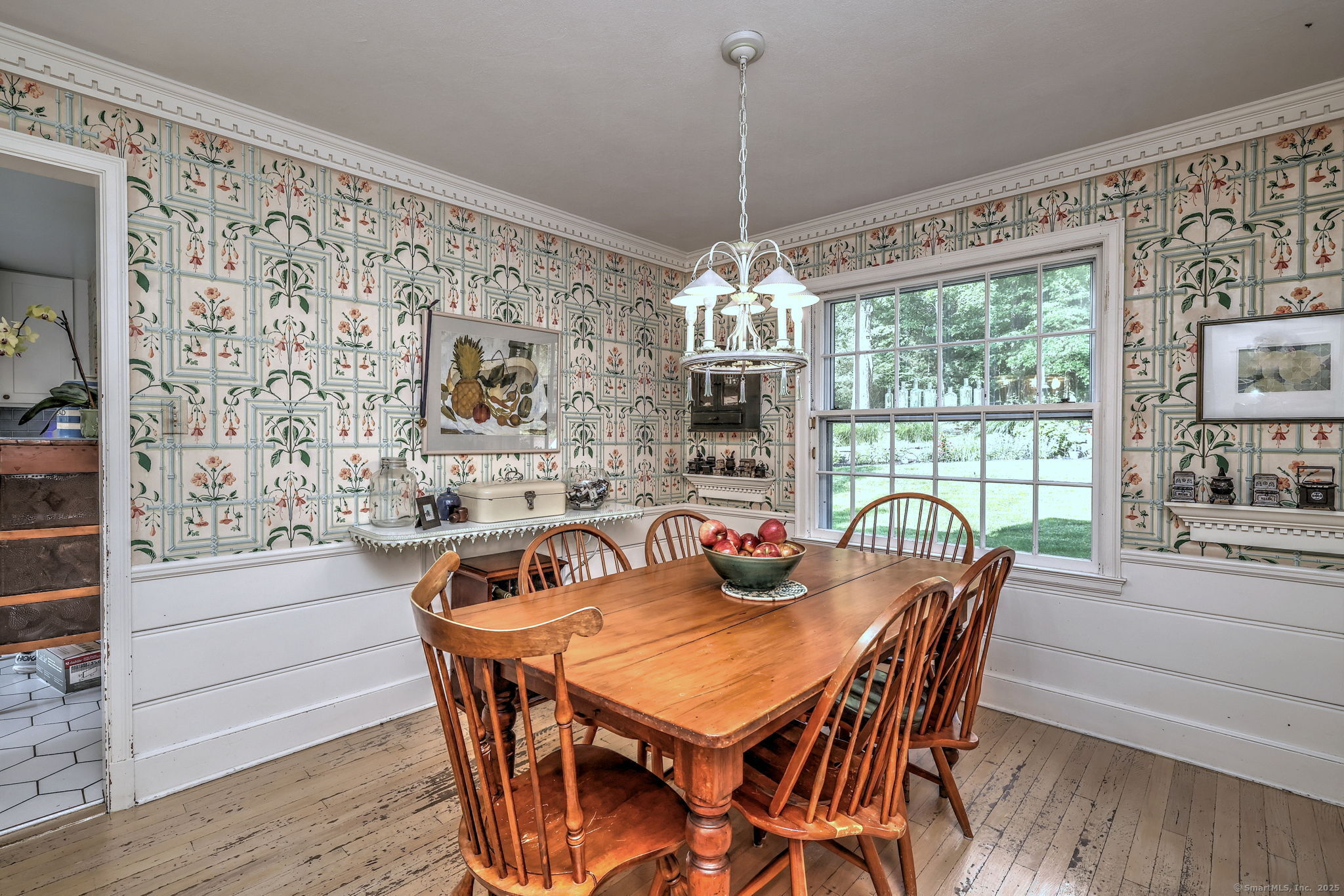 4 Brook Road Woodbridge, CT 06525 - Photo 21 of 40 a dining room with furniture a chandelier and wooden floor