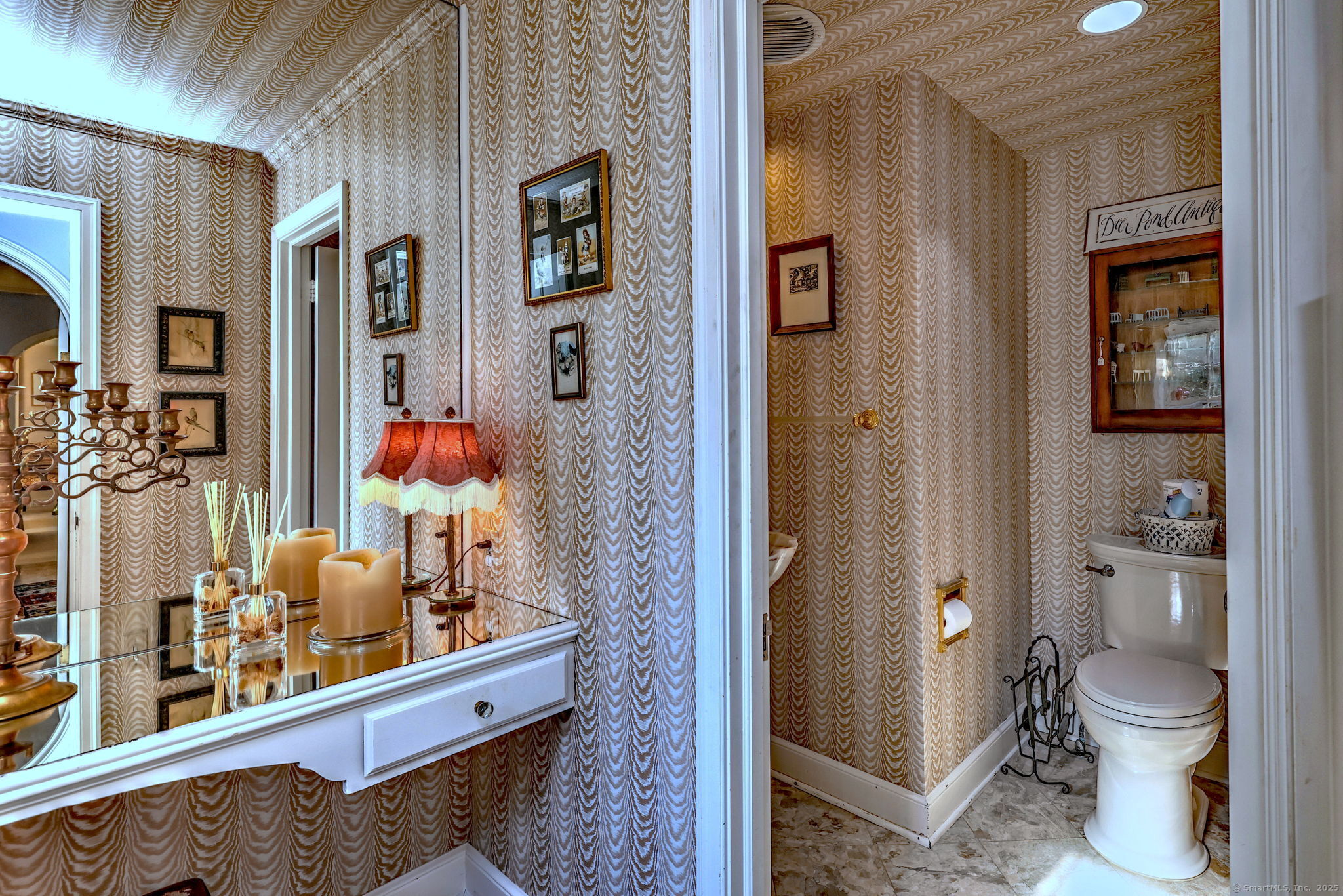 4 Brook Road Woodbridge, CT 06525 - Photo 23 of 40 a room with painting and a lamp