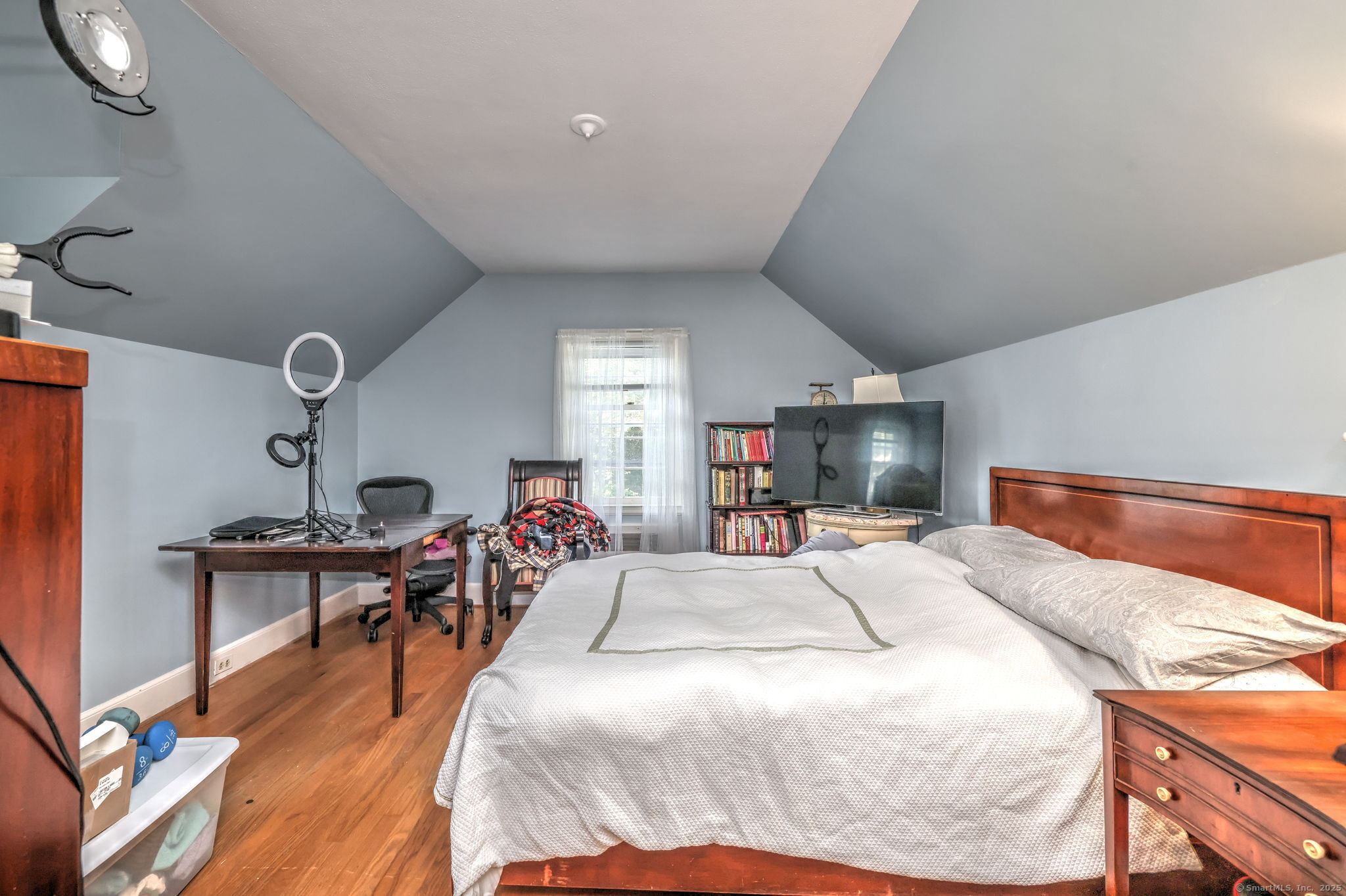 4 Brook Road Woodbridge, CT 06525 - Photo 36 of 40 a bed room with a bed and a chair