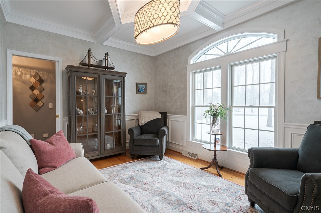 8262 Ashington Drive Lysander, NY 13027 - Photo 12 of 50 THE ELEGANT ELLIPSE WINDOW, GRACEFULLY BATHES THIS