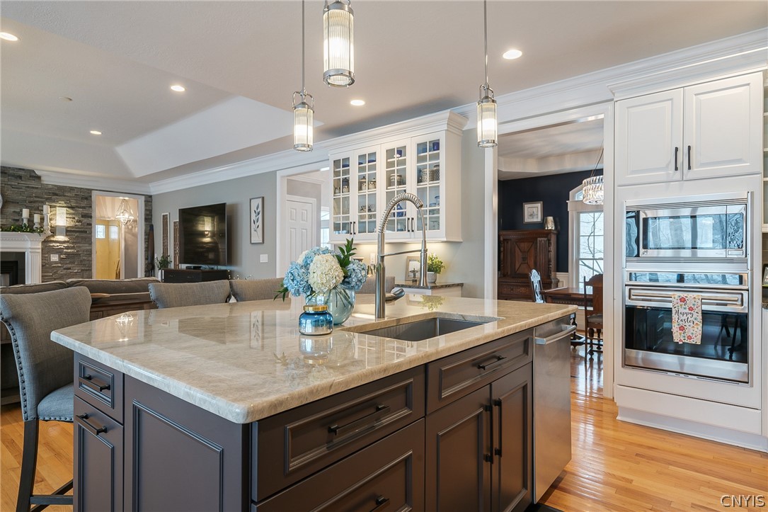 8262 Ashington Drive Lysander, NY 13027 - Photo 13 of 50 THE CENTER ISLAND IN THE CHEF'S KITCHEN IS TRULY S