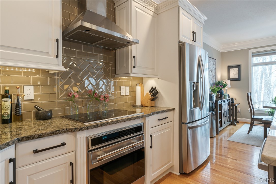 8262 Ashington Drive Lysander, NY 13027 - Photo 16 of 50 WOLF INDUCTION COOKTOP WITH A STAINLESS OUTSIDE VE