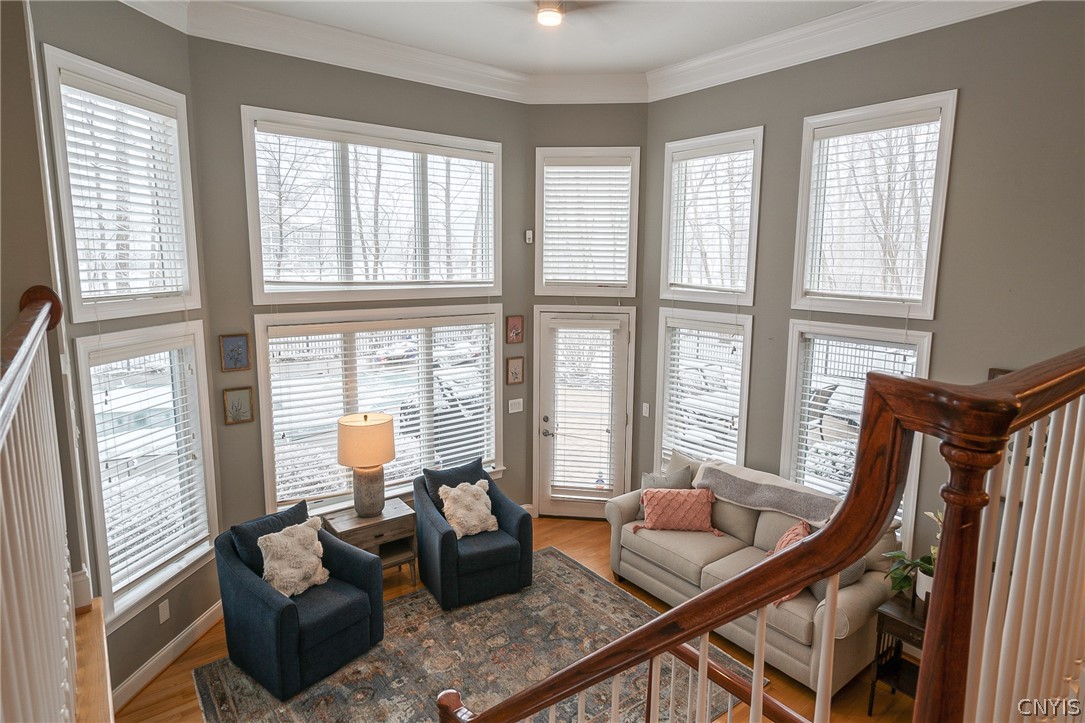 8262 Ashington Drive Lysander, NY 13027 - Photo 22 of 50 THE ATRIUM FLOODED WITH NATURAL LIGHT SERVES AS A