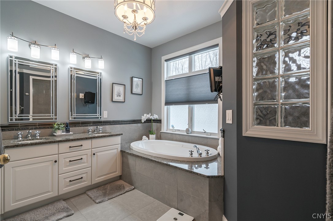 8262 Ashington Drive Lysander, NY 13027 - Photo 24 of 50 THE PRIMARY BATH OFFERS A LUXURIOUS AND COMFORTABL