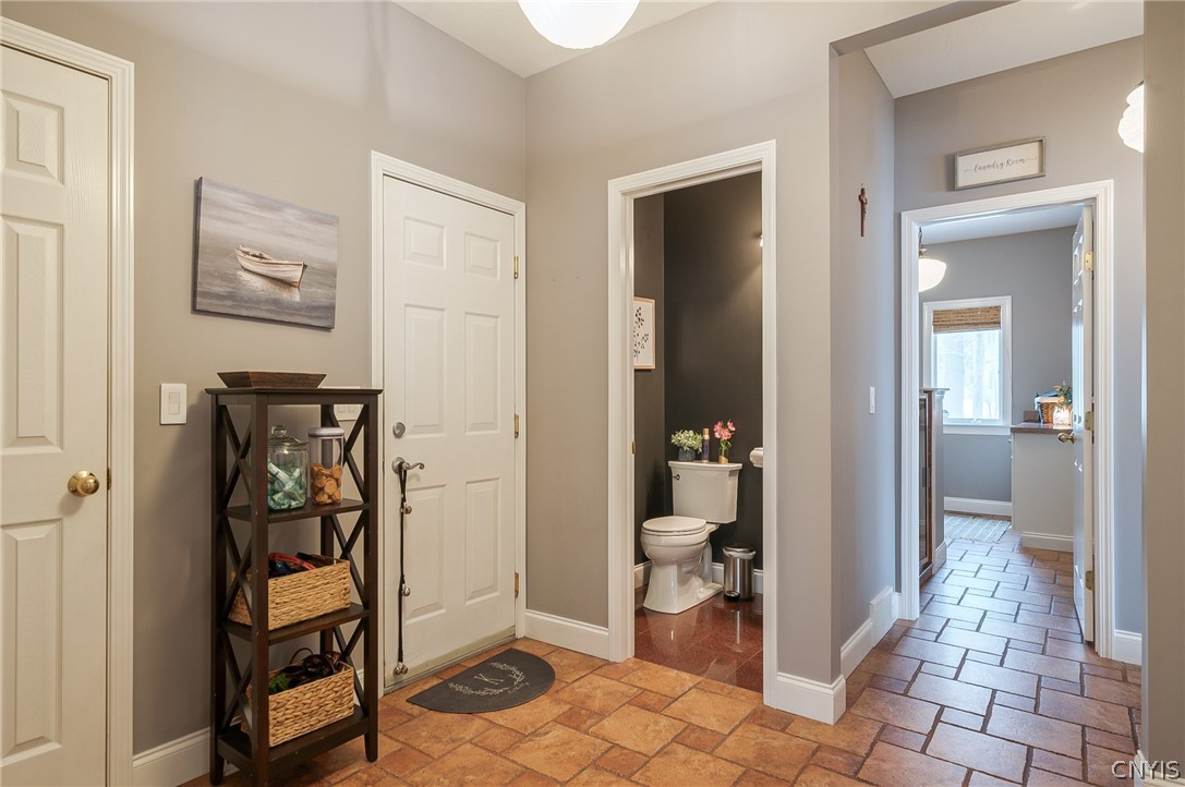 8262 Ashington Drive Lysander, NY 13027 - Photo 34 of 50 A WELL-DESIGNED FUNCTIONAL MUDROOM! HAVING TWO KIT