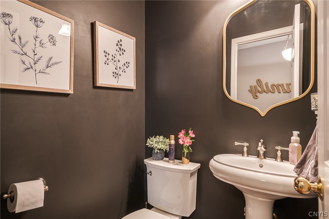 8262 Ashington Drive Lysander, NY 13027 - Photo 35 of 50 POWDER ROOM OFF THE MUDROOM FOR CONVENIENCE AND MO