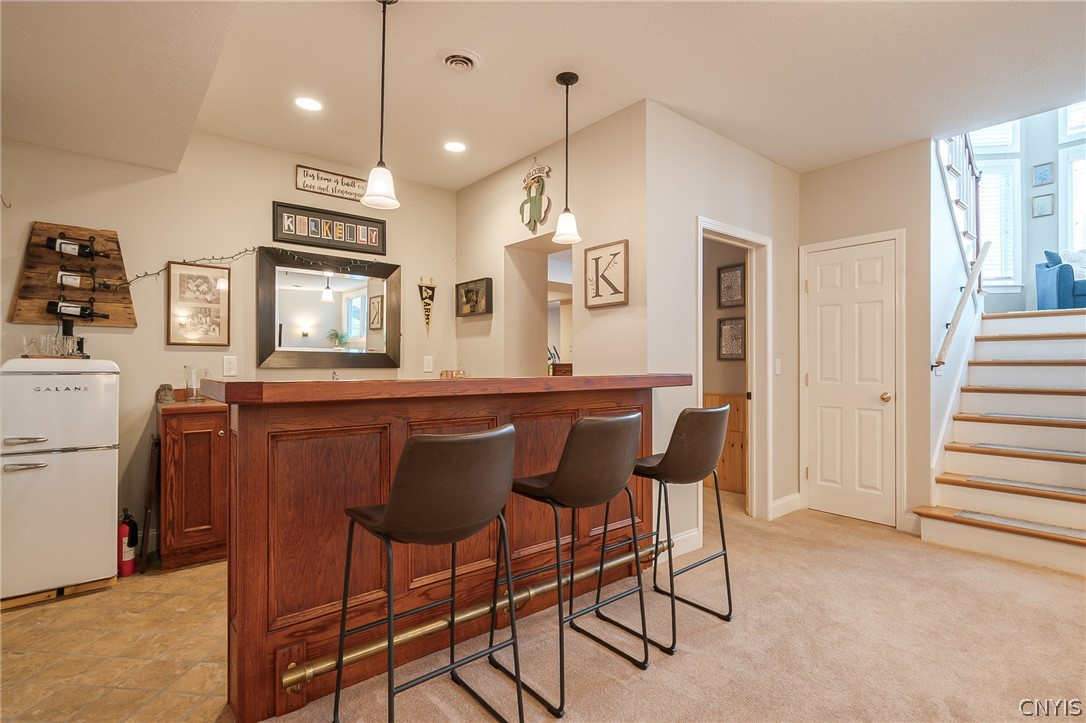 8262 Ashington Drive Lysander, NY 13027 - Photo 42 of 50 WITH AMPLE SPACE AND COMFORTABLE AMENITIES, THISLO