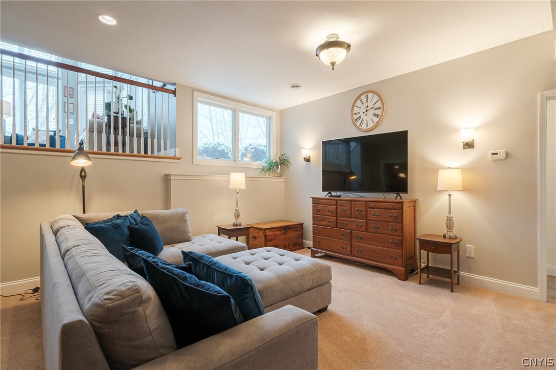 8262 Ashington Drive Lysander, NY 13027 - Photo 43 of 50 THE FAMILY OR MEDIA ROOM OFFERS A VERSATILE AREA F