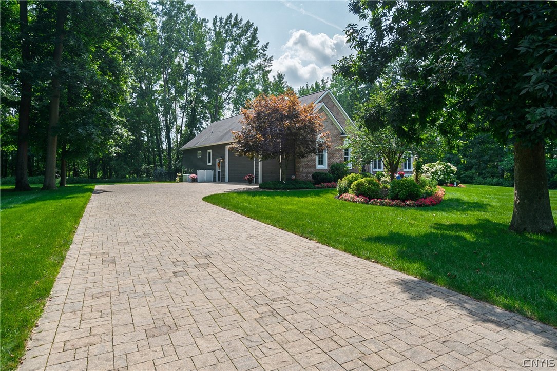 8262 Ashington Drive Lysander, NY 13027 - Photo 50 of 50 THIS CUSTOM PAVER DRIVEWAY NOT ONLY ADDS AESTHETIC