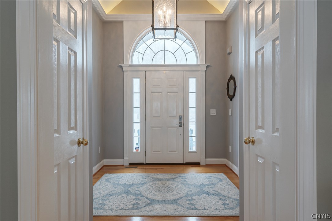 8262 Ashington Drive Lysander, NY 13027 - Photo 6 of 50 IN THE MAIN ENTRANCE FOYER WITH THE CURVATURE AND