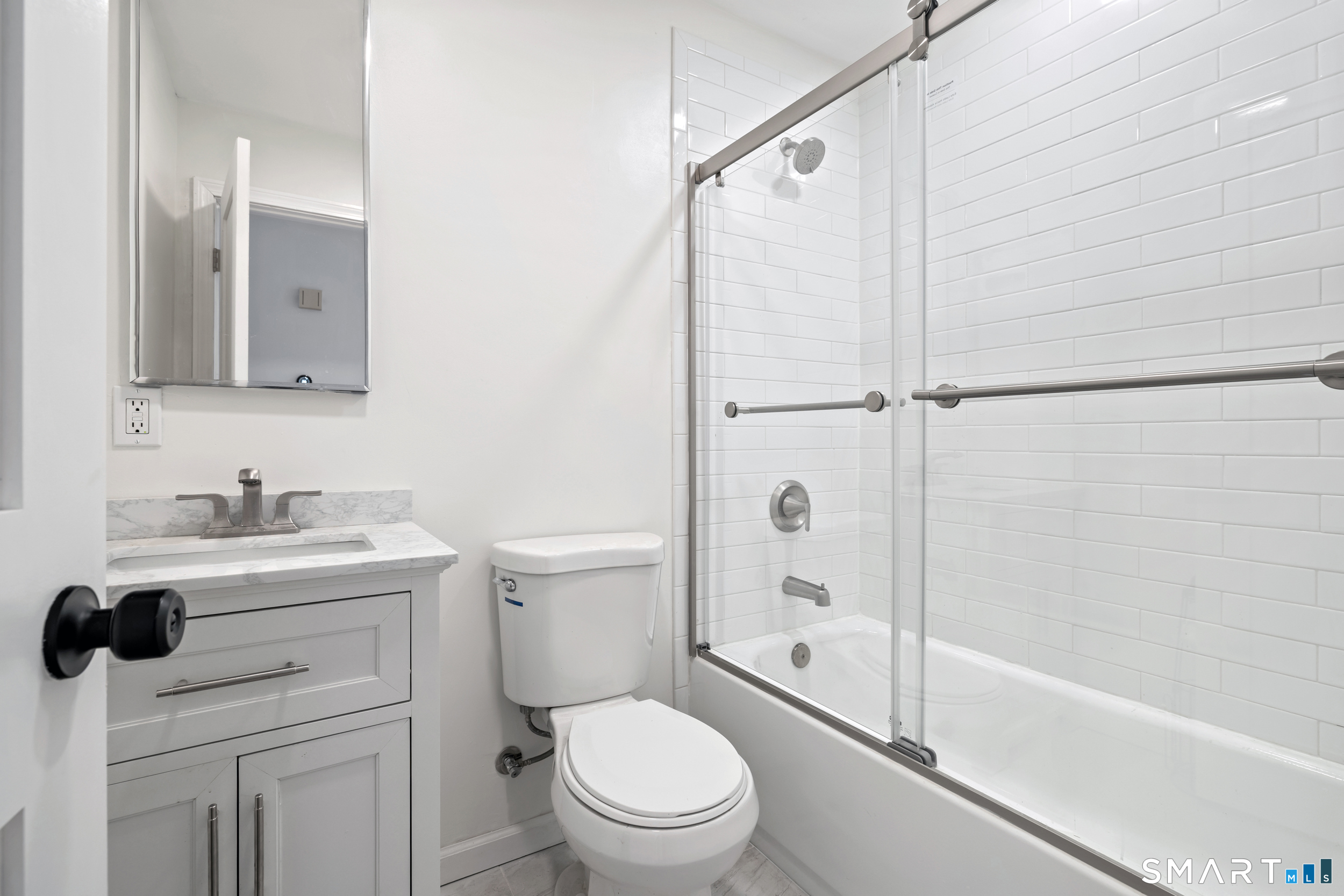 115 Wheeler Road Monroe, CT 06468 - Photo 12 of 18 a bathroom with a sink a toilet and a bathtub