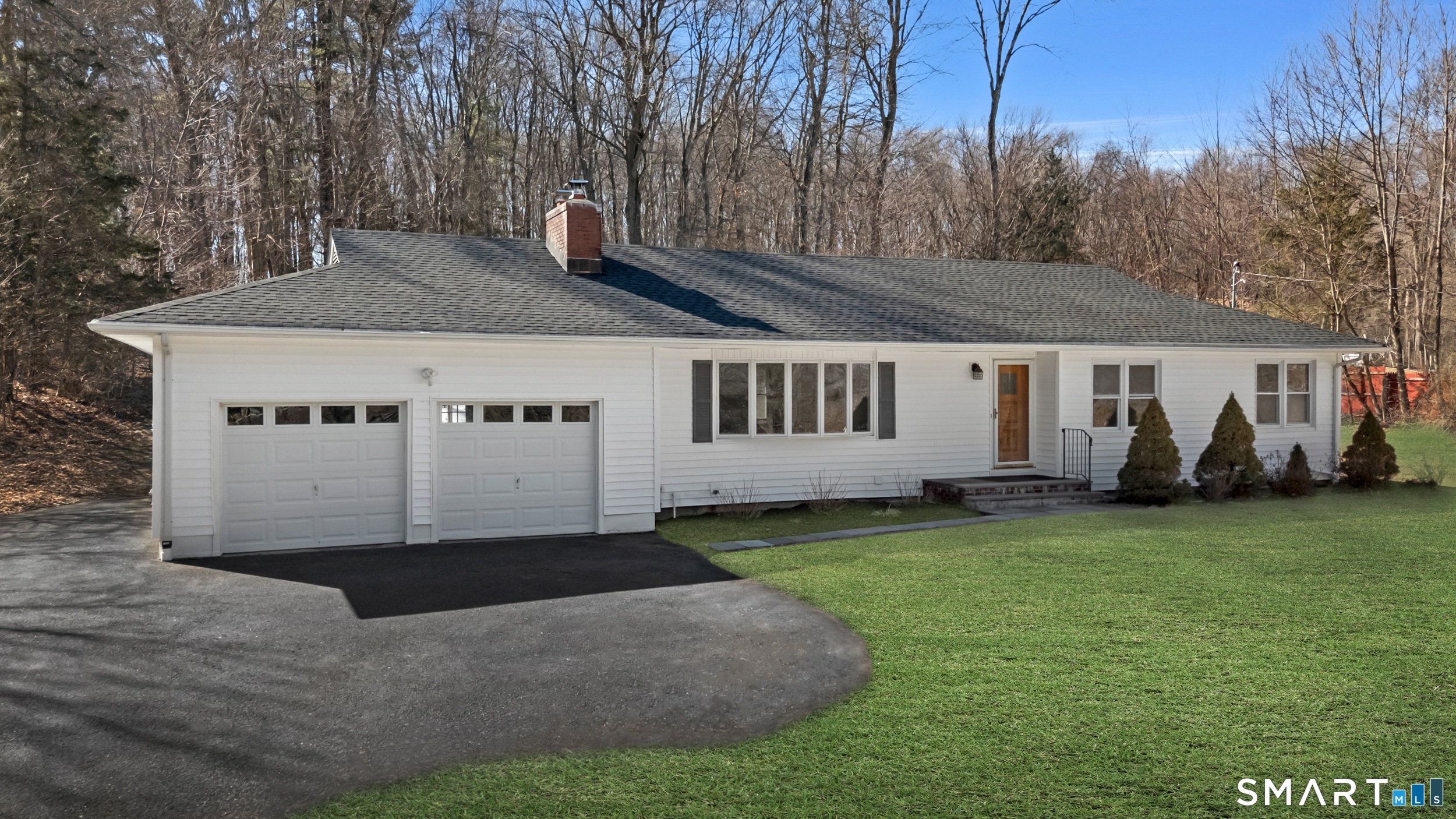 115 Wheeler Road Monroe, CT 06468 - Photo 16 of 18 a house view with a garden space