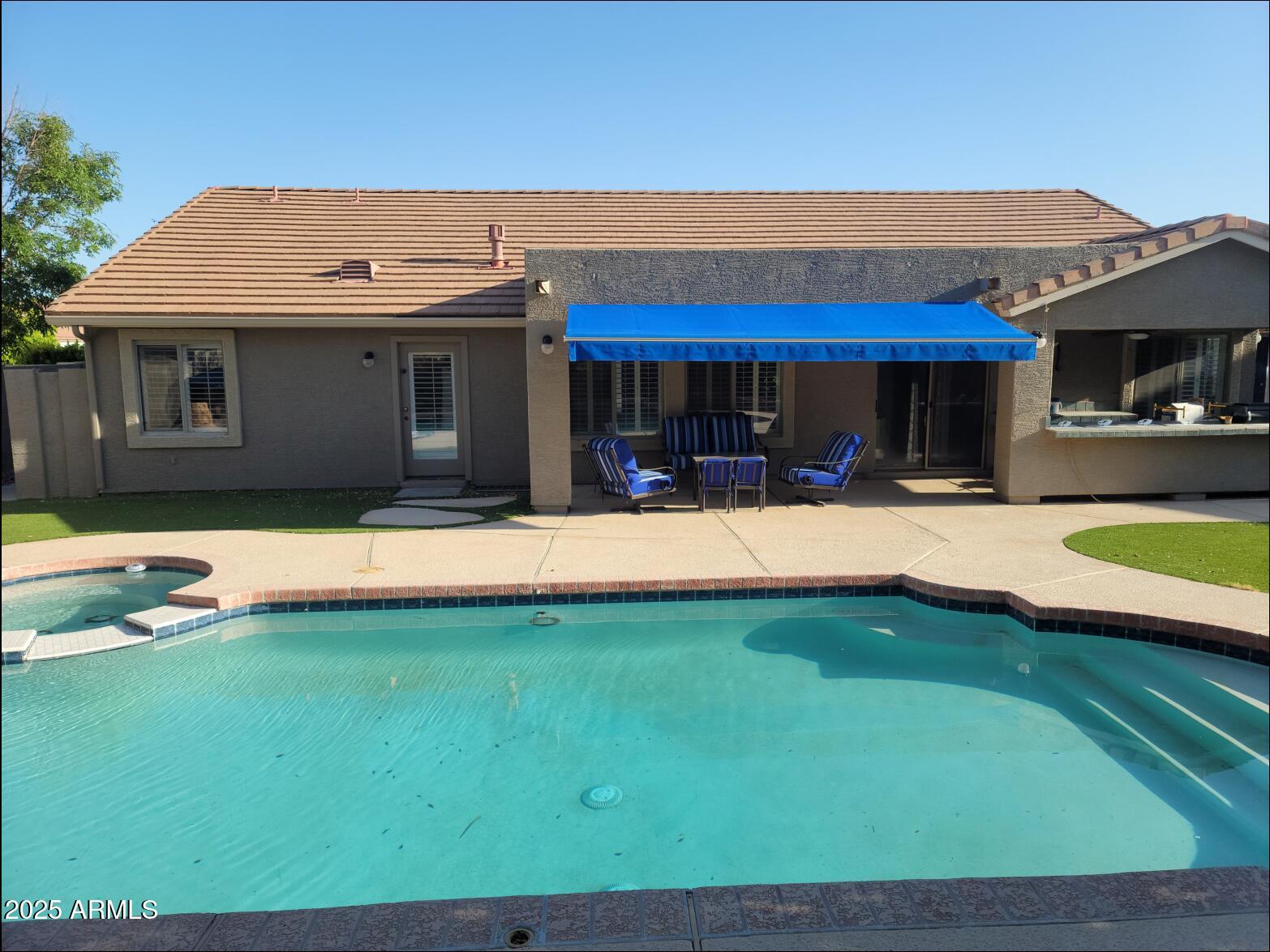 3060 East Hope Street Mesa, AZ 85213 - Photo 50 of 61 48 Hope patio area with pool and awning