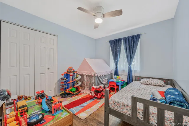 a bedroom with furniture and a bed