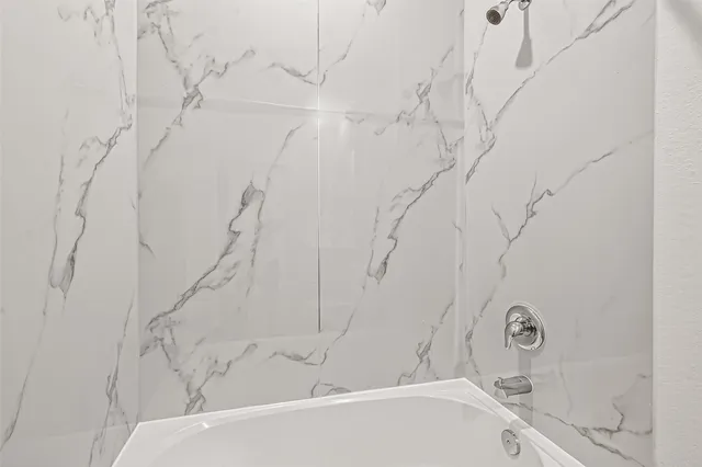 a bathroom with a bathtub